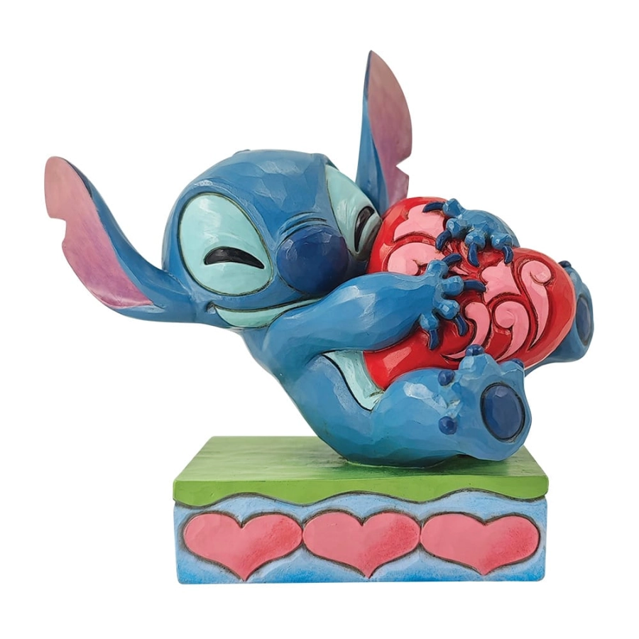 Stitch knuffelt hart beeldje Disney Traditions
